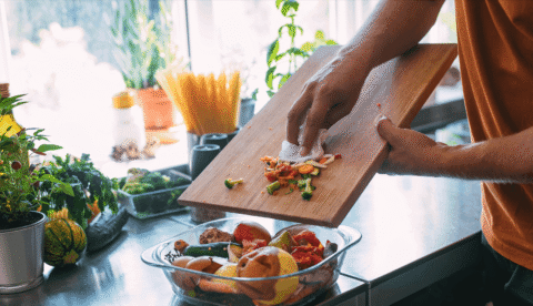 kitchen-scraps-into-a-bowl